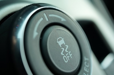 Close up of a driver assistance technology button in a car. 